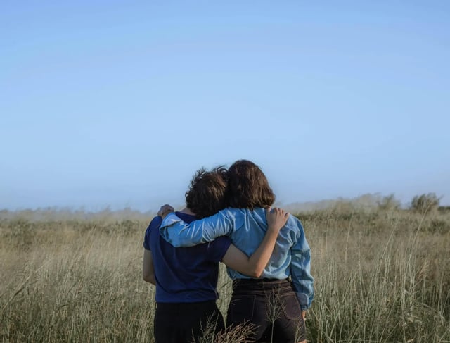 Travellers walking through countryside